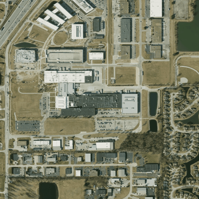 Roche Diagnostics' Indianapolis campus (Hague Road) from above — the site of the announced $550 million, five-year investment.